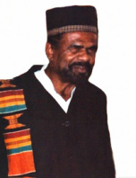 Don Galloway wearing kente stole and headcovering
