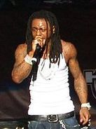 Lil Wayne singing into microphone