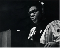 Barbara Jordan in regalia giving speech