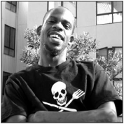 Photo of Leroy Moore wearing a skull and crossbones t-shirt